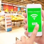 Mobile payment concept, Blur supermarket background, business and financial, technology.